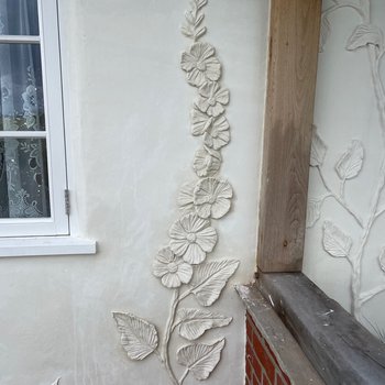 Handcrafted pargetting design on heritage property
