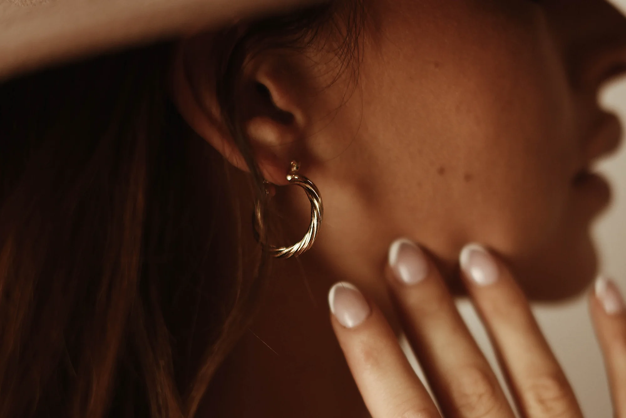 Vintage jewellery photographed on textured fabric